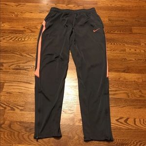 Women's gray Nike soccer pants.